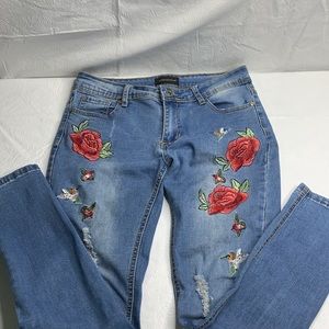 Bluejeans with roses and hummingbirds embroidered